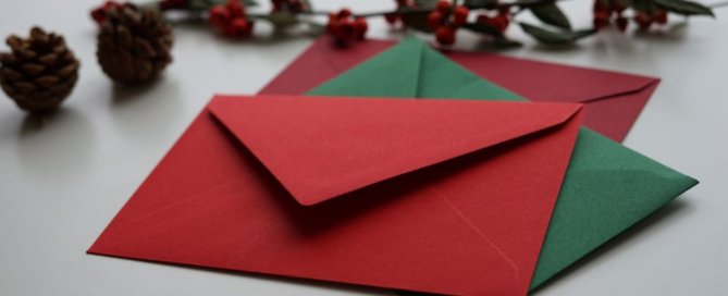 Letters and envelopes with festive decorations.